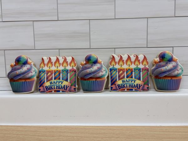 Cupcake and candle cookies printed on the Blue