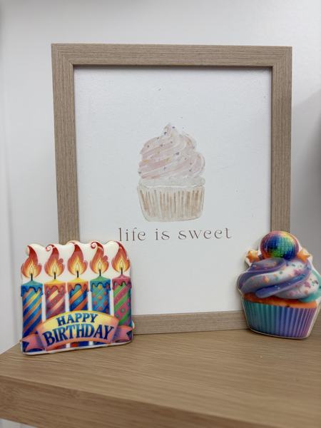 Cupcake and candle cookies printed on the Blue