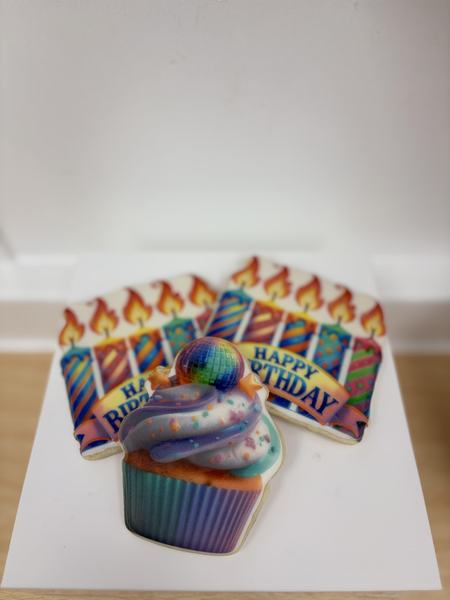 Cupcake and candle cookies printed on the Blue
