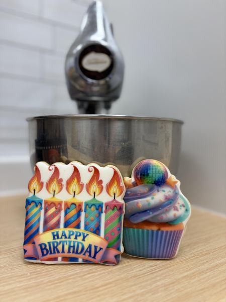 Cupcake and candle cookies printed on the Blue