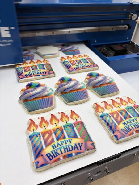 Cupcake and candle cookies printed on the Blue